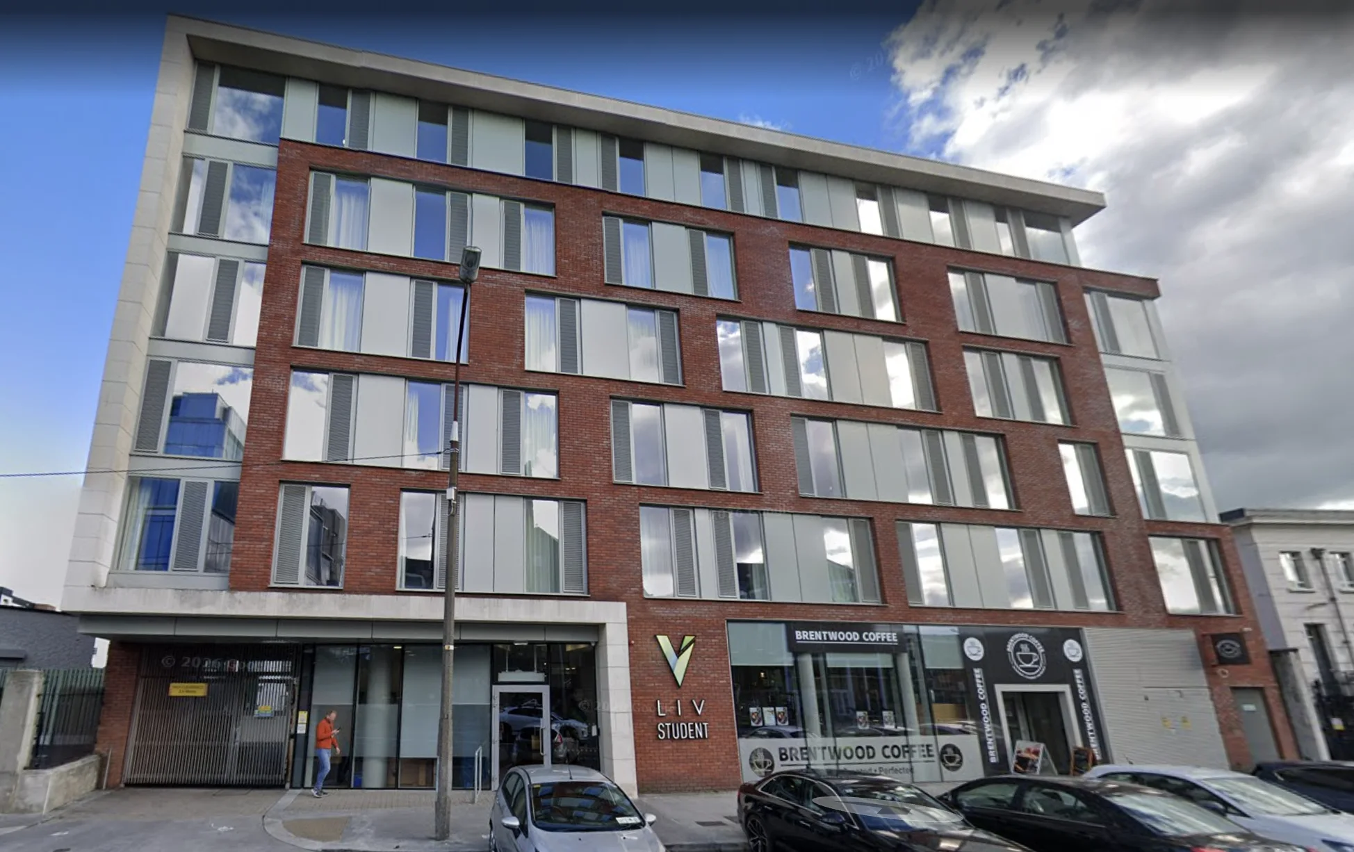 Street-level view of the Dublin student residence and its storefronts