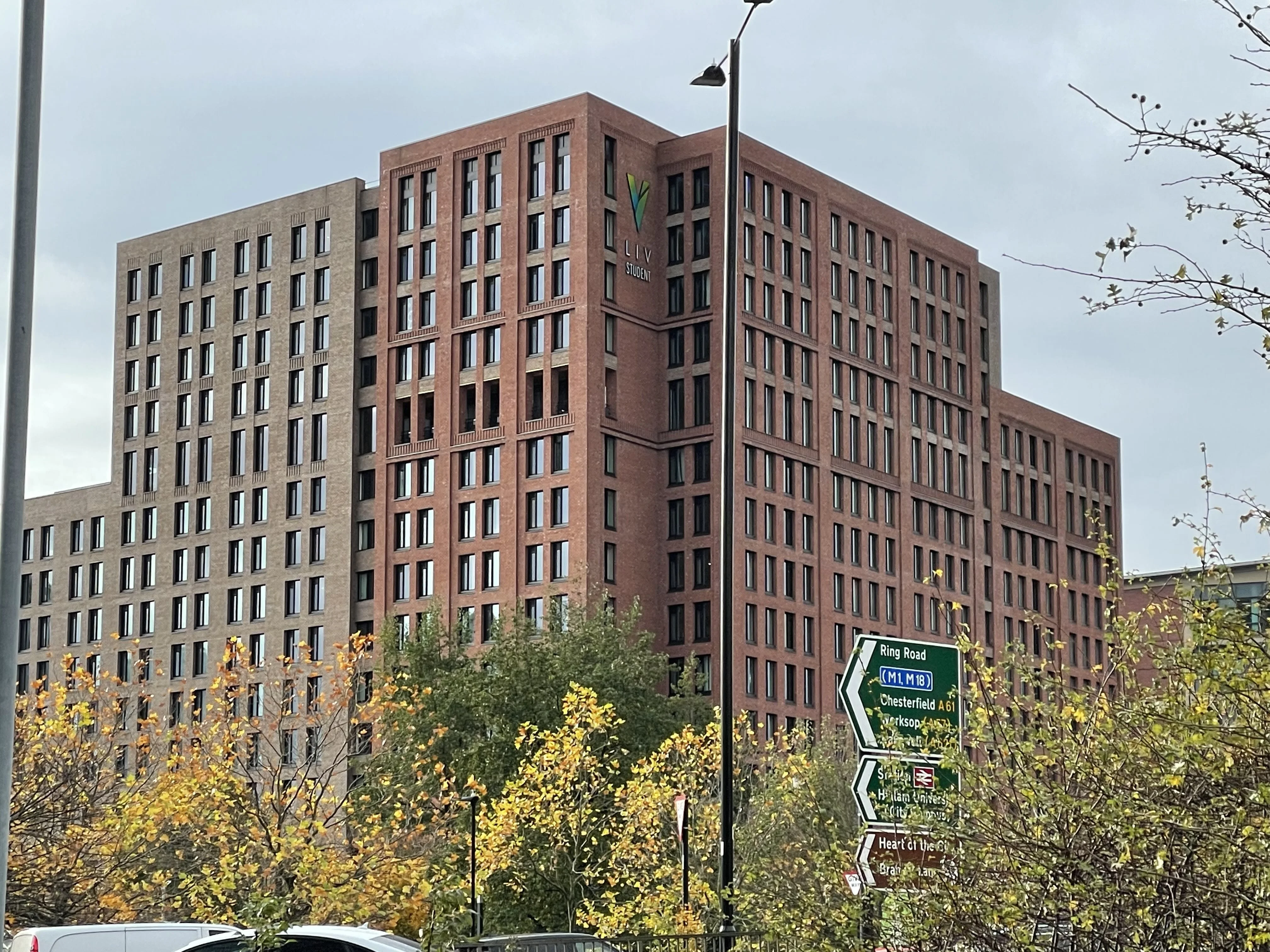 Multi-storey brick student residence in Sheffield seen from the street